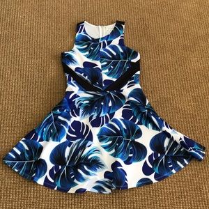 Girls blue, teal and white patterned dress